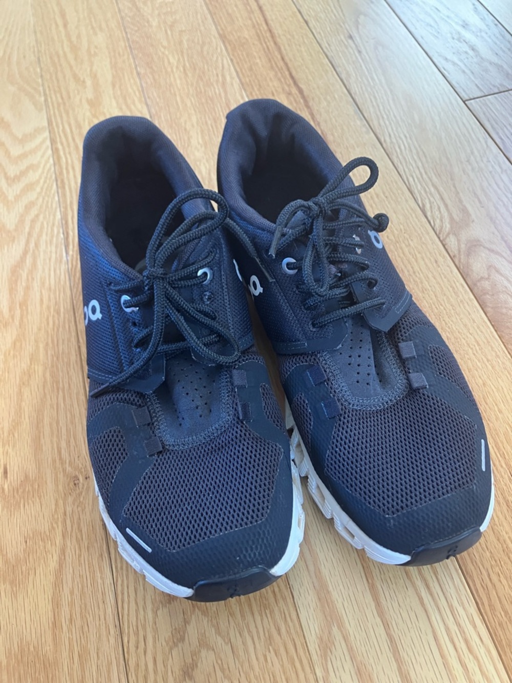 On Running women’s Athletic Lace-Up Shoes in Black and White